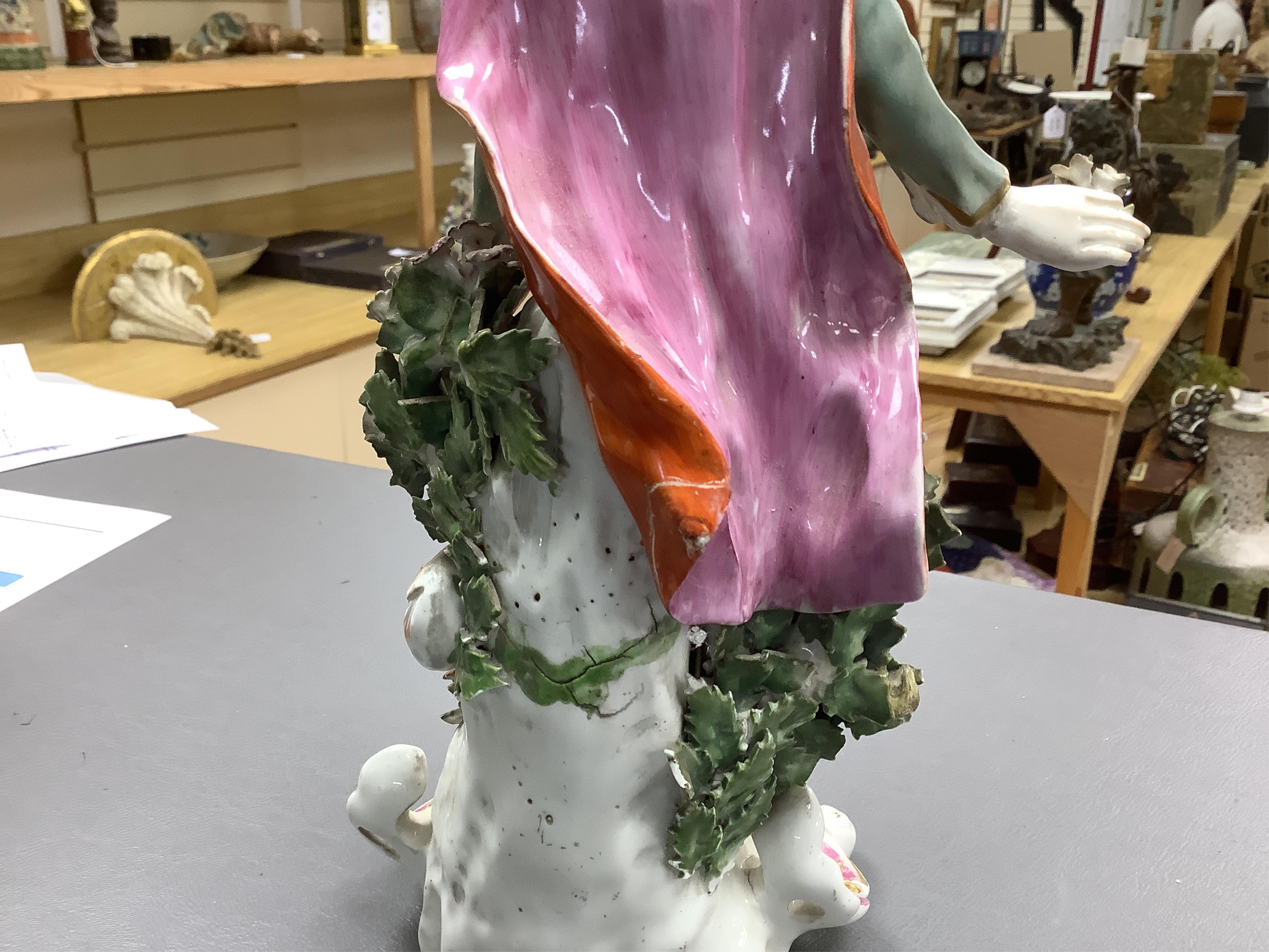A pair of 18th century Derby porcelain figures of a lady and gentleman, 27cm high